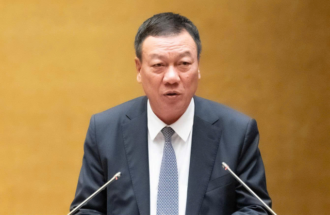 Tổng Thanh tra Chính phủ Đoàn Hồng Phong trình bày báo cáo giải trình, tiếp thu ý kiến đại biểu về dự án luật, chiều 10/12. Ảnh: Media Quốc hội