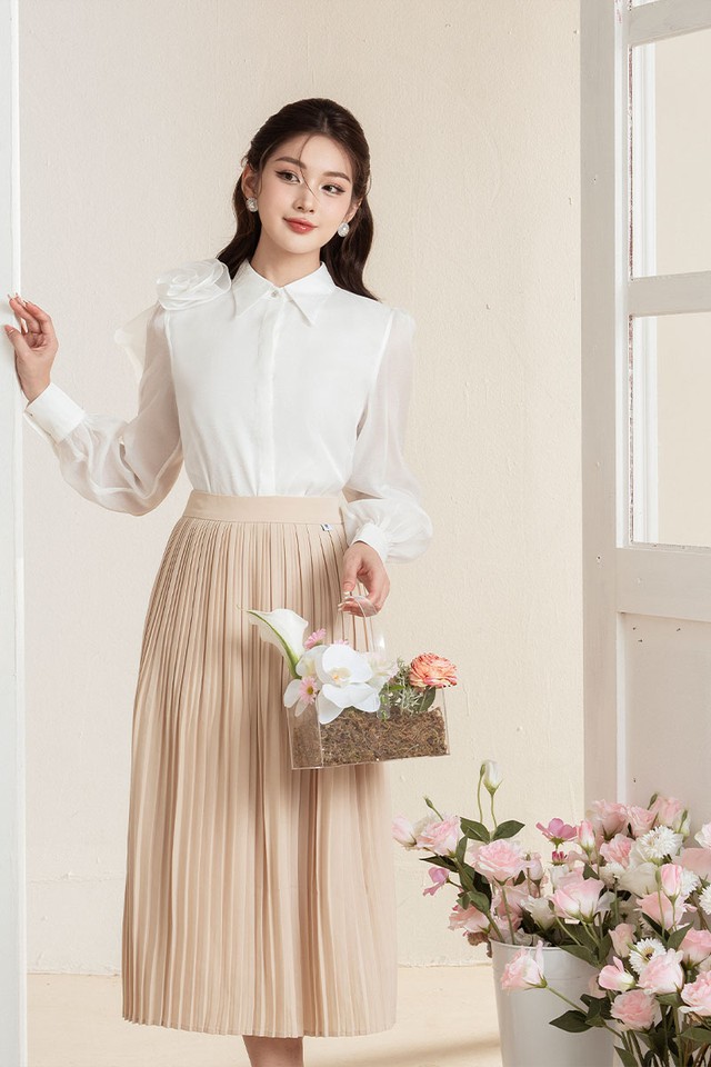 Chân váy xếp ly ăn gian vóc dáng, cho vẻ ngoài cuốn hút- Ảnh 1. Chân váy xếp ly ăn gian vóc dáng, cho vẻ ngoài cuốn hút- Ảnh 1.