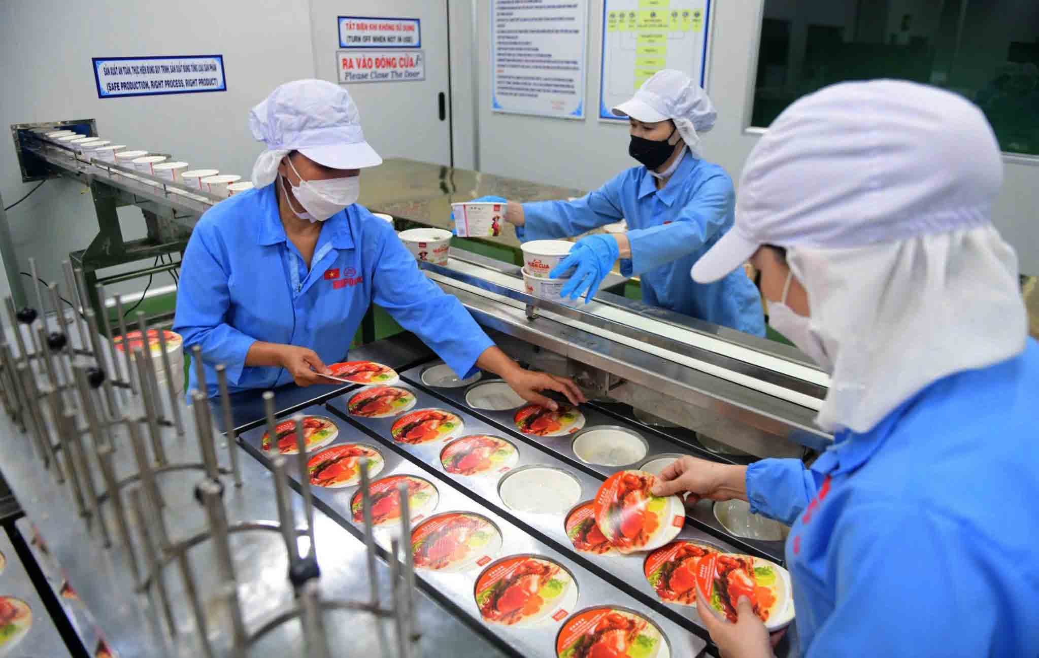 Đề xuất điều chỉnh lương tối thiểu vùng: Tránh cảnh qua đường, qua cầu là khác tiền lương - Ảnh 1. Đề xuất phân lại lương tối thiểu vùng: Tránh cảnh qua đường, qua cầu là khác tiền lương - Ảnh 1.