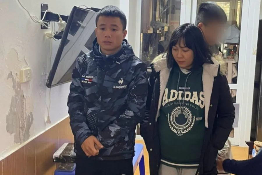 Vợ chồng Vinh, Thêm bị bắt giữ. Ảnh: CA lua-dao.jpg