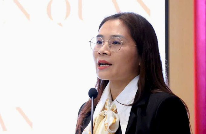 Bà Phạm Thị Khánh Toàn, Vụ Giám đốc kiểm tra III, TAND Tối cao phát biểu tại hội nghị. Ảnh: Linh Đan