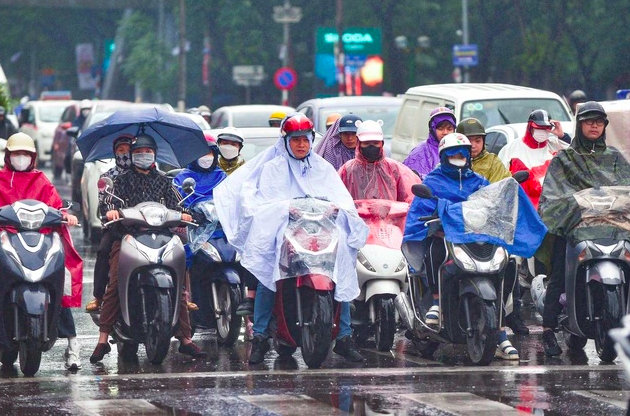 Không khí lạnh mạnh tràn xuống, miền Bắc giảm 10 độ C, trời rét đậm kèm mưa lớn - Ảnh 1. Không khí lạnh mạnh tràn xuống, miền Bắc giảm 10 độ C, trời rét đậm kèm mưa lớn - Ảnh 1.