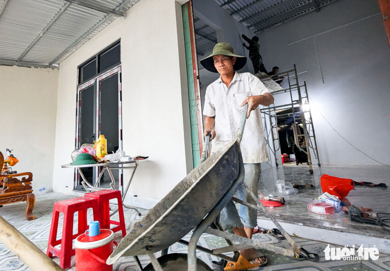 Nụ cười ấm lại dưới mái nhà sau bão lũ - Ảnh 7. chiến dịch quang trung - Ảnh 7.