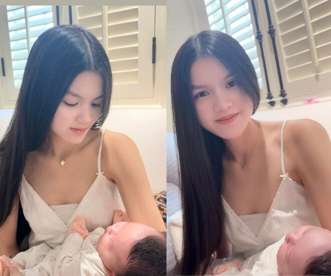 Phương Lê khoe 2 con "chung nửa huyết thống", ái nữ NSƯT Vũ Luân ngủ ngoan khi được chị gái bế bồng 1 Khoảnh khắc con gái lớn của Phương Lê bế bồng em gái.