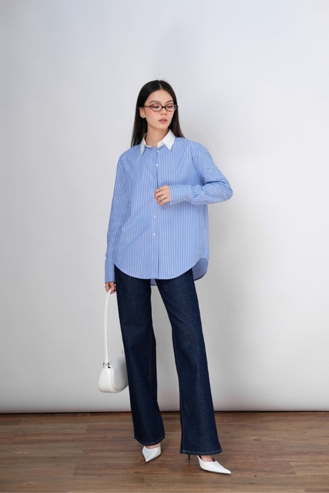 Quần jeans và áo sơ mi, 'cặp đôi vàng' nâng tầm phong cách thanh lịch- Ảnh 1. Quần jeans và áo sơ mi, 'cặp đôi vàng' nâng tầm phong cách thanh lịch- Ảnh 1.