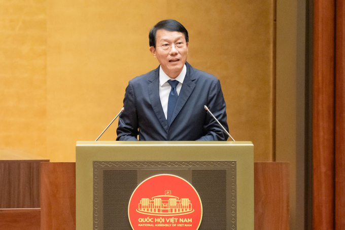 Bộ trưởng Công an Lương Tam Quang trình bày báo cáo giải trình tiếp thu sáng 10/12. Ảnh: Hoàng Phong