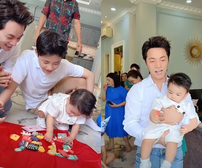 Quý tử thứ 3 của Đăng Khôi vừa cầm bút, vừa cầm mic trong tiệc thôi nôi, được cả nhà mong thành Giáo sư 1 Quý tử nhà Đăng Khôi cầm chặt cây bút trong phần bốc đồ vật, đoán tương lai.