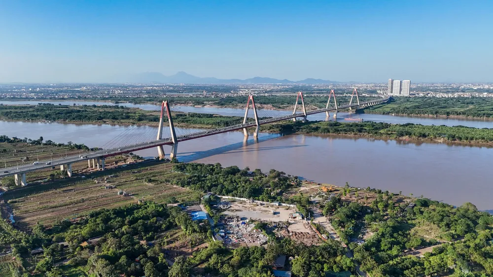 Siêu dự án Trục đại lộ cảnh quan sông Hồng có tổng vốn đầu tư 855.000 tỉ, sử dụng 11.000 ha đất trải dài qua 19 xã, phường hai bên bờ sông Hồng. Ảnh: TRỌNG PHÚ truc-dai-lo-canh-quan-song-hong-1.jpg