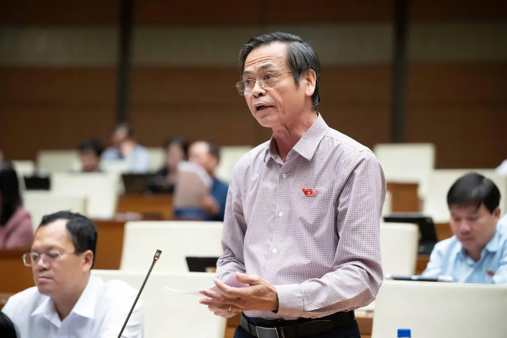 Đại biểu Trần Hữu Hậu (đoàn Tây Ninh). Ảnh: QH sua-nghi-quyet-98-de-xuat-go-vuong-cho-hang-tram-du-an-bt-tai-tp-hcm-tran-huu-hau.jpg