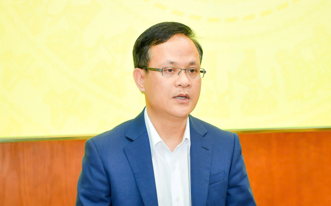 Ông Phạm Chí Quang, Vụ trưởng Chính sách tiền tệ phát biểu tại họp báo 29/12. Ảnh: SBV