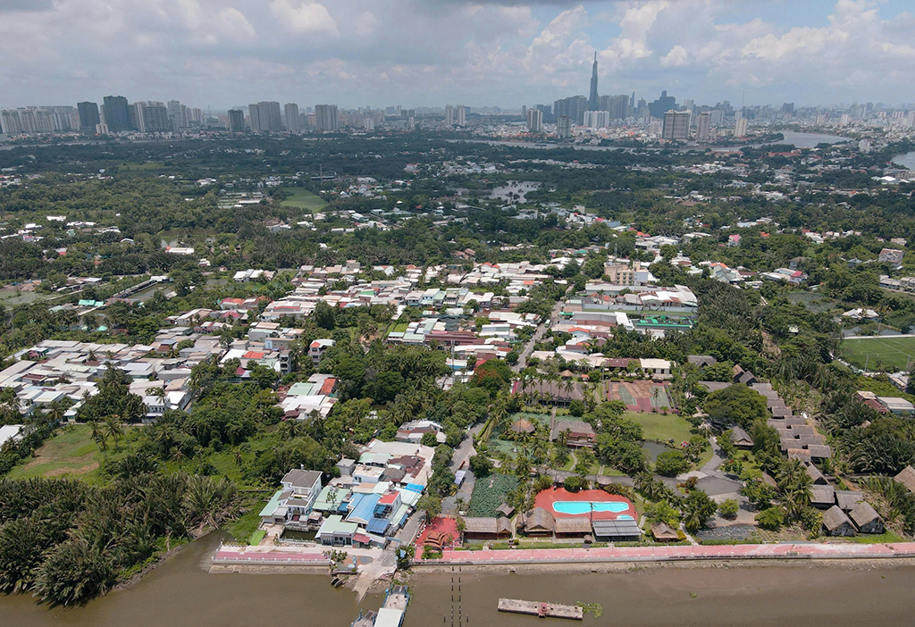 Từ 2026, tách thửa, chuyển đất vườn sang đất ở nộp tiền sử dụng đất ra sao?- Ảnh 1. Từ 2026, tách thửa, chuyển đất vườn sang đất ở nộp tiền sử dụng đất ra sao?- Ảnh 1.