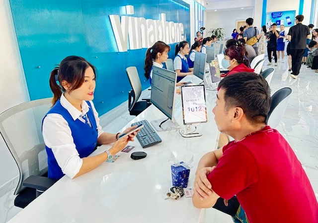 VNPT TP.HCM triển khai điểm giao dịch không giấy tờ- Ảnh 1.