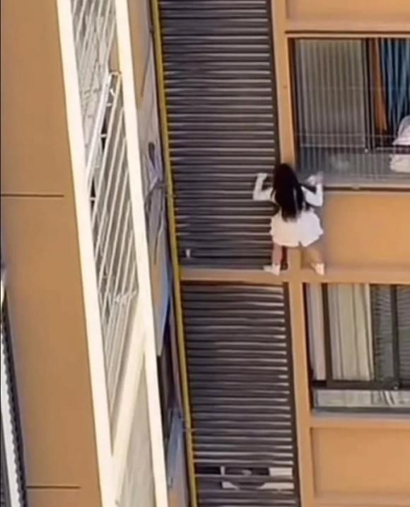 trốn khỏi chung cư 0 chung cư, cô gái trèo chung cư, ngoại tình