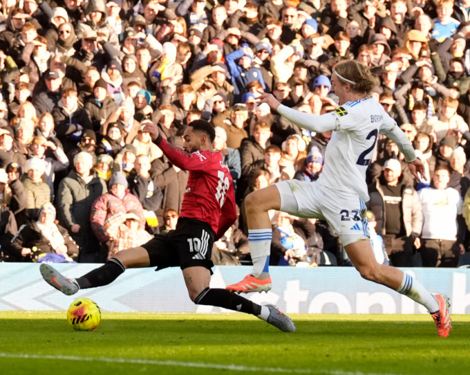 Matheus Cunha sút chéo góc ấn định tỷ số hòa 1-1. Ảnh: PA