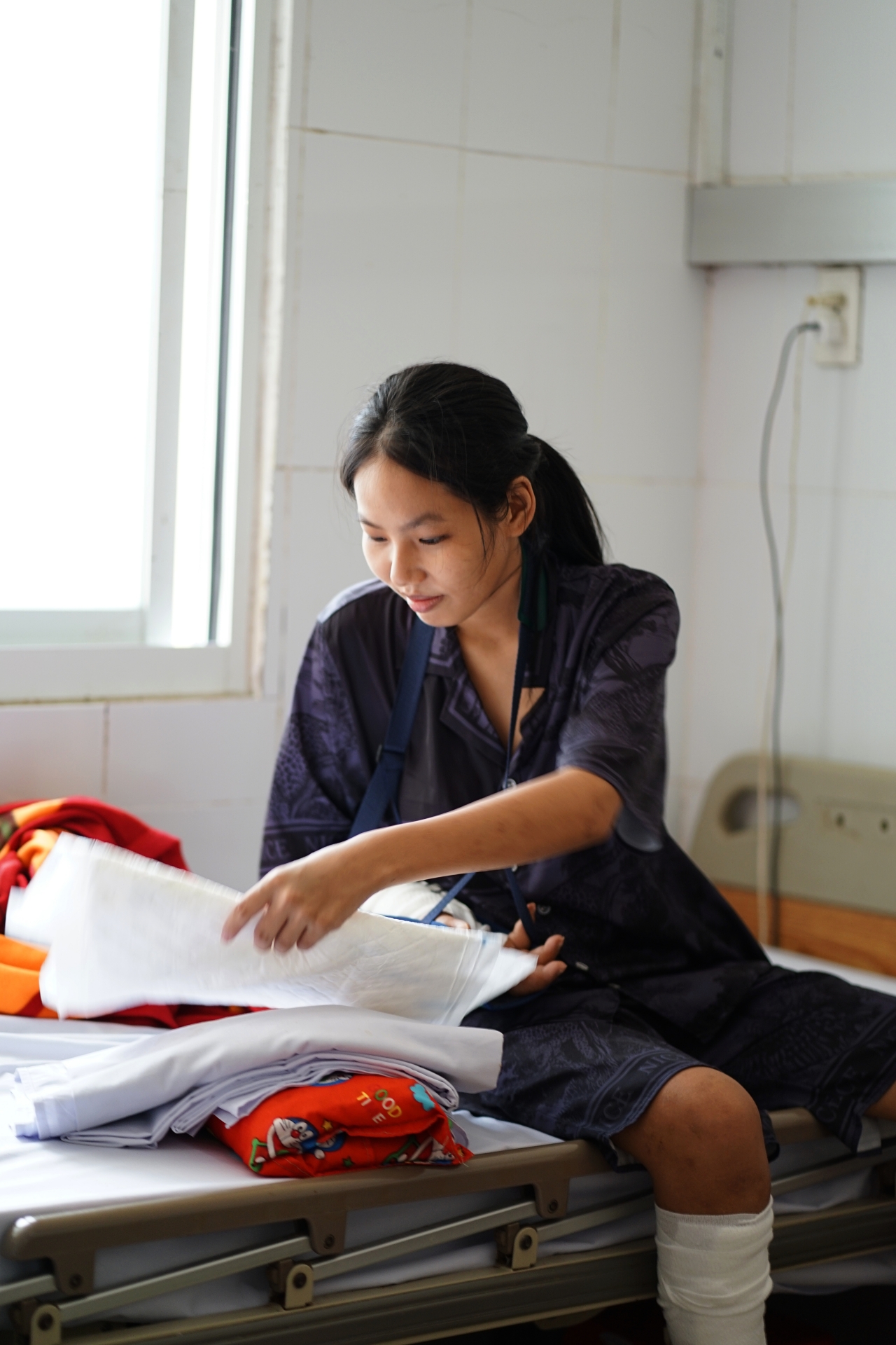 Gặp người mẹ trong ca ghép nối bàn tay được “nuôi” gần 2 tháng dưới chân: “Tết này với chị vậy là trọn vẹn”- Ảnh 5. Gặp người mẹ trong ca ghép nối bàn tay được “nuôi” gần 2 tháng dưới chân: “Tết này với chị vậy là trọn vẹn”- Ảnh 5.