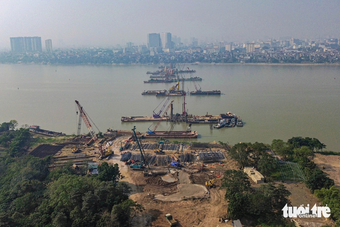 Công trường thi công cây cầu biểu tượng gần 16.000 tỉ ở trung tâm Hà Nội - Ảnh 17.