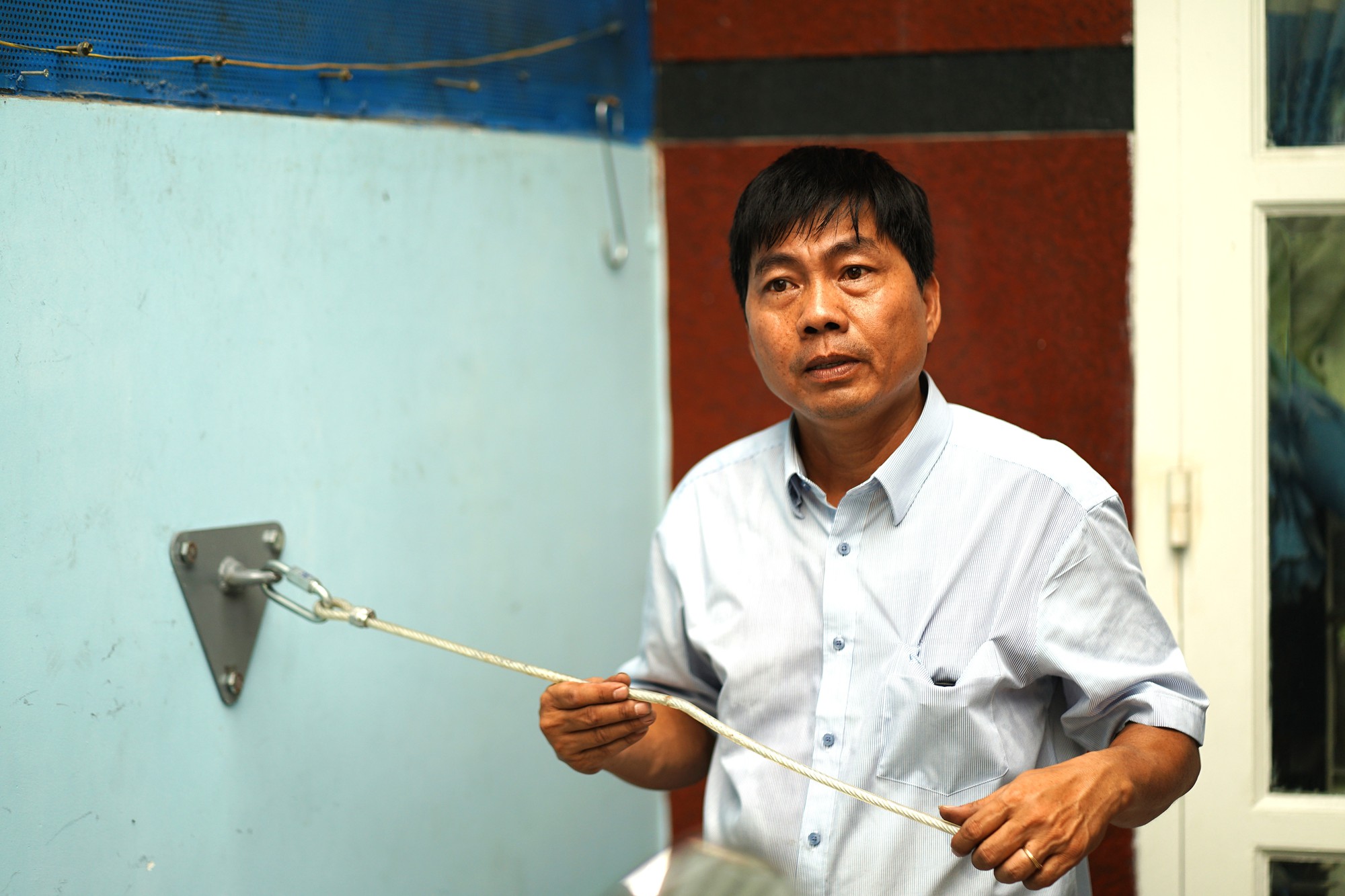 Gặp 2 cha con ở TP.HCM sáng chế thoát hiểm cháy nổ nhà cao tầng bằng cách không ai ngờ!- Ảnh 4.