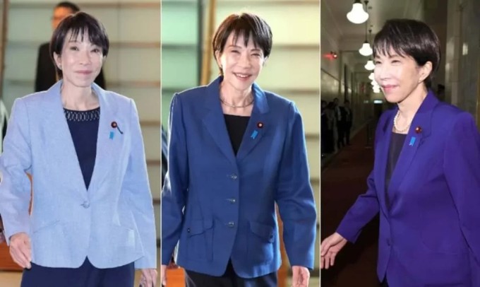 Bà Sanae Takaichi thích diện balzer xanh với váy liền thân tối giản cùng tông màu đen. Ảnh: Ataru Haruna