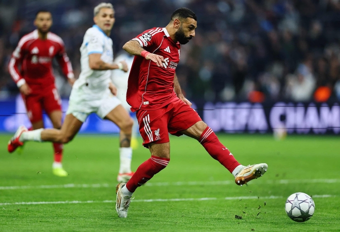 Salah dứt điểm trong trận thắng Marseille ngày 21/1. Ảnh: Reuters