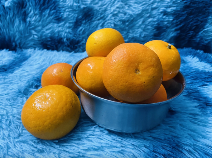 Cam giúp gan loại bỏ độc tố từ rượu và giảm tình trạng viêm nhiễm do cồn gây ra. Ảnh: Mai Cat