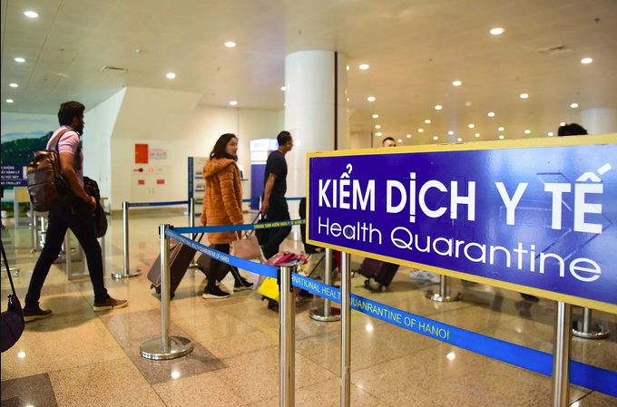 Kiểm dịch y tế để kiểm soát Covid tại sân bay Nội Bài thời kỳ bùng dịch. Ảnh: Giang Huy