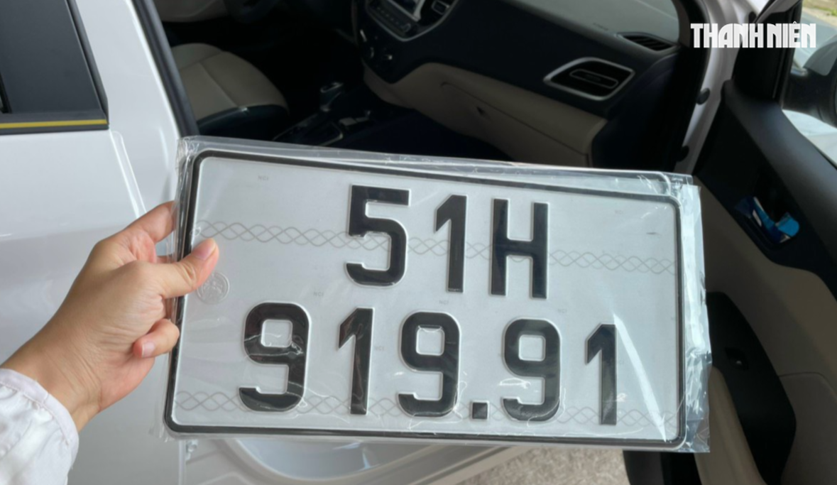 Lệ phí cấp biển số ô tô tại Hà Nội, TP.HCM giảm còn 14 triệu đồng 1 Lệ phí cấp biển số ô tô tại Hà Nội, TP.HCM giảm còn 14 triệu đồng - Ảnh 1.