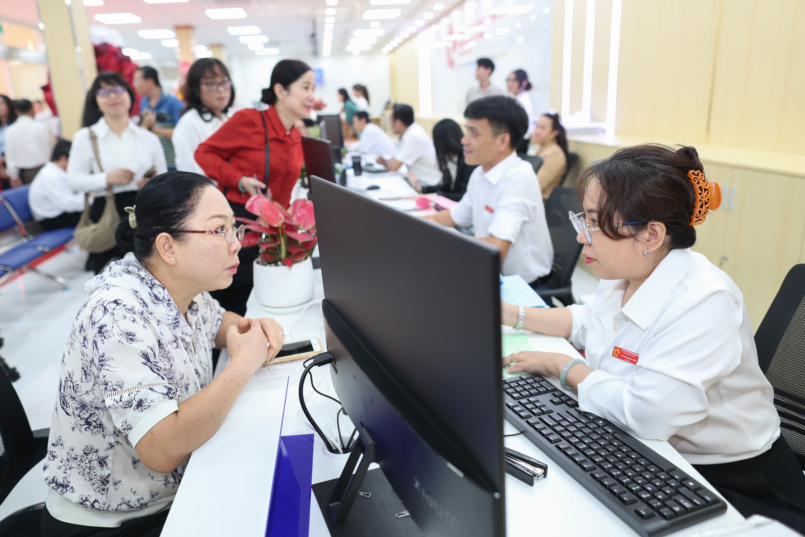 Nỗ lực để phục vụ người dân và doanh nghiệp tốt hơn - Ảnh 1.