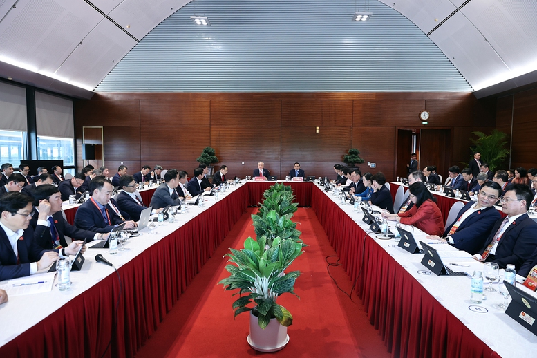 Thảo luận tại Đại hội XIV, Thủ tướng Phạm Minh Chính nhấn mạnh quyết tâm tăng trưởng hai con số - Ảnh 1.