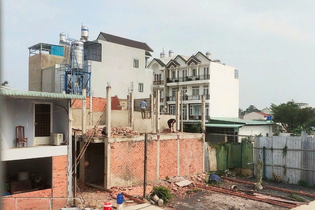 Tin vui cho người dân TPHCM khi đi xin giấy phép xây nhà - 1