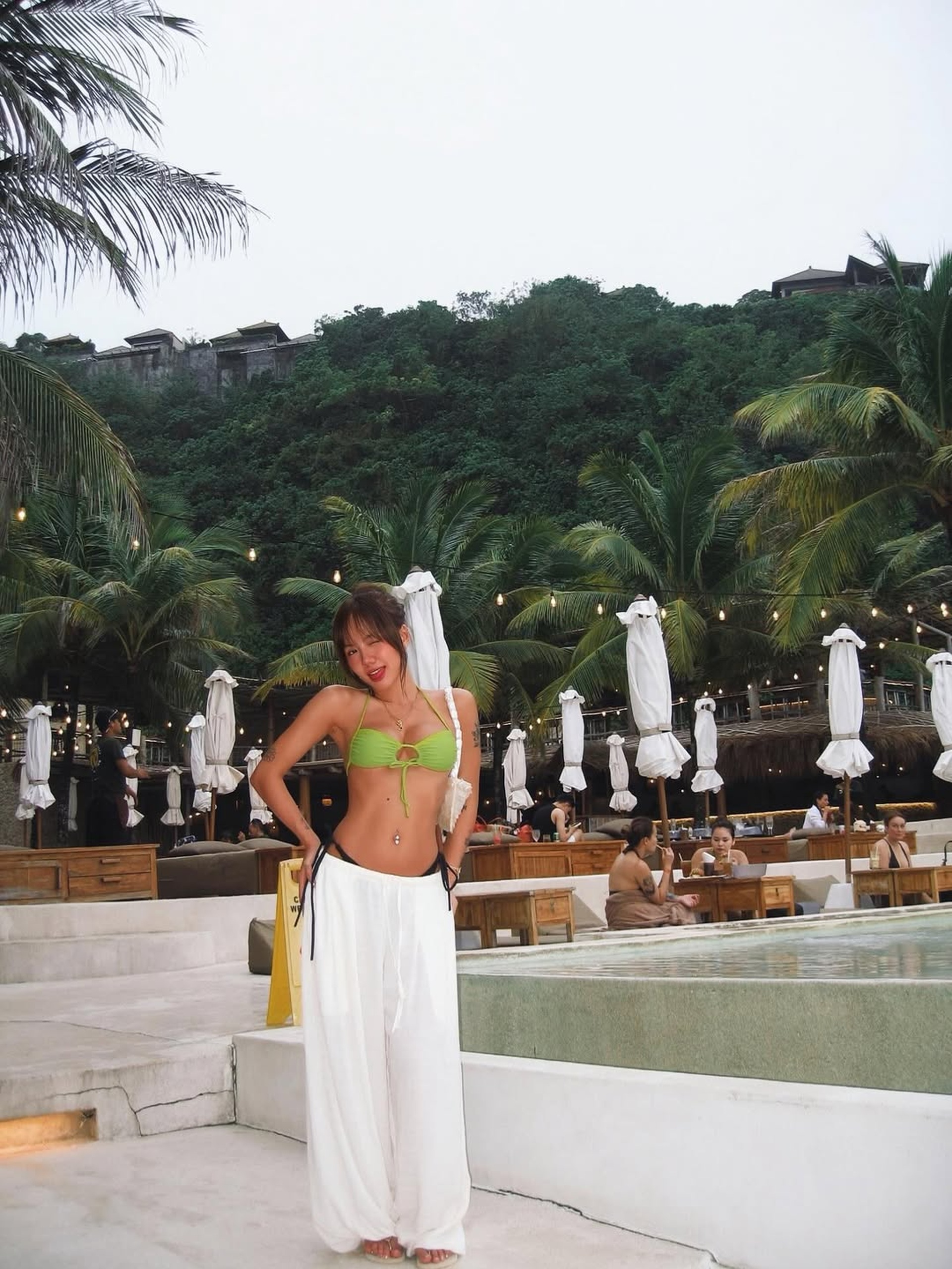 Phương Ly gợi cảm với làn da nâu, kín tiếng sau tin đồn chia tay nam rapper - 5