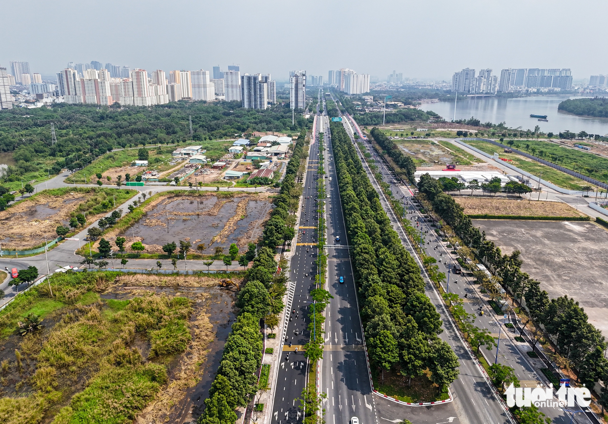 Flycam hướng tuyến đường sắt Bến Thành - Thủ Thiêm, vượt sông Sài Gòn, chạy dọc đường Mai Chí Thọ - Ảnh 11.