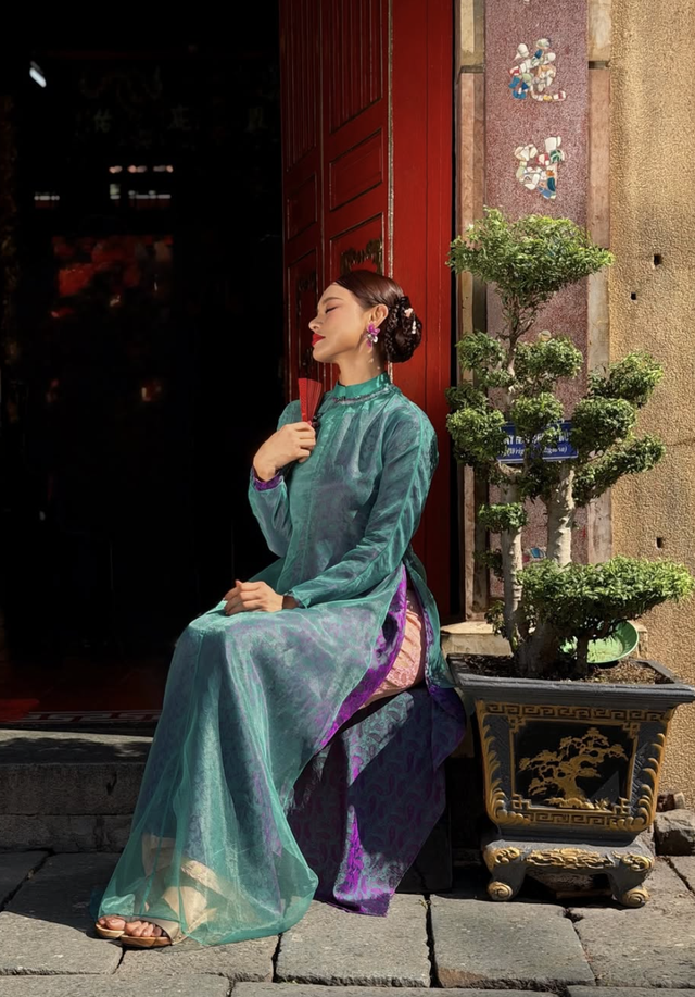 Áo dài xanh lá, lựa chọn mới của vẻ đẹp quốc dân ngày tết- Ảnh 12.
