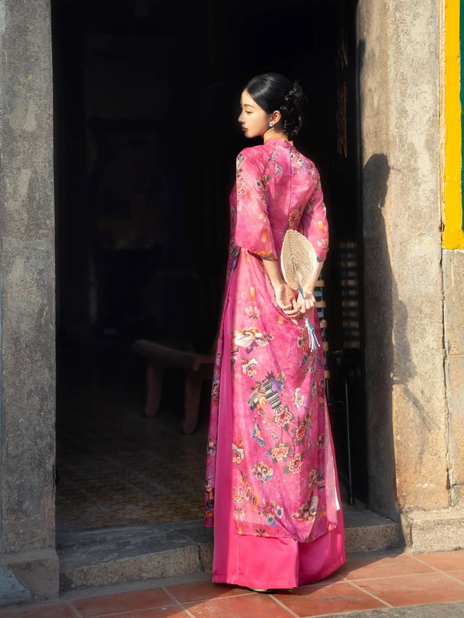 Áo dài hồng, sắc xuân ngọt ngào trong thời trang ngày tết- Ảnh 7.