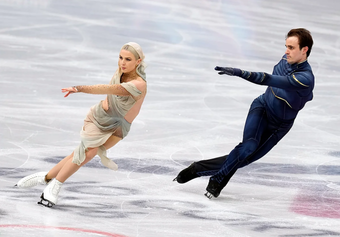 Olivia Smart (trái) và Tim Dieck thi đấu tại Olympic mùa Đông 2026. Ảnh: ABC