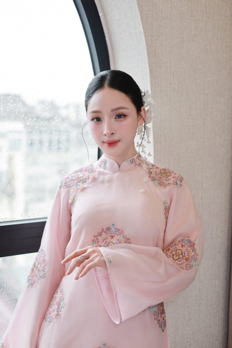 Gu diện áo dài của Hoa hậu Trương Hồ Phương Nga - 5
