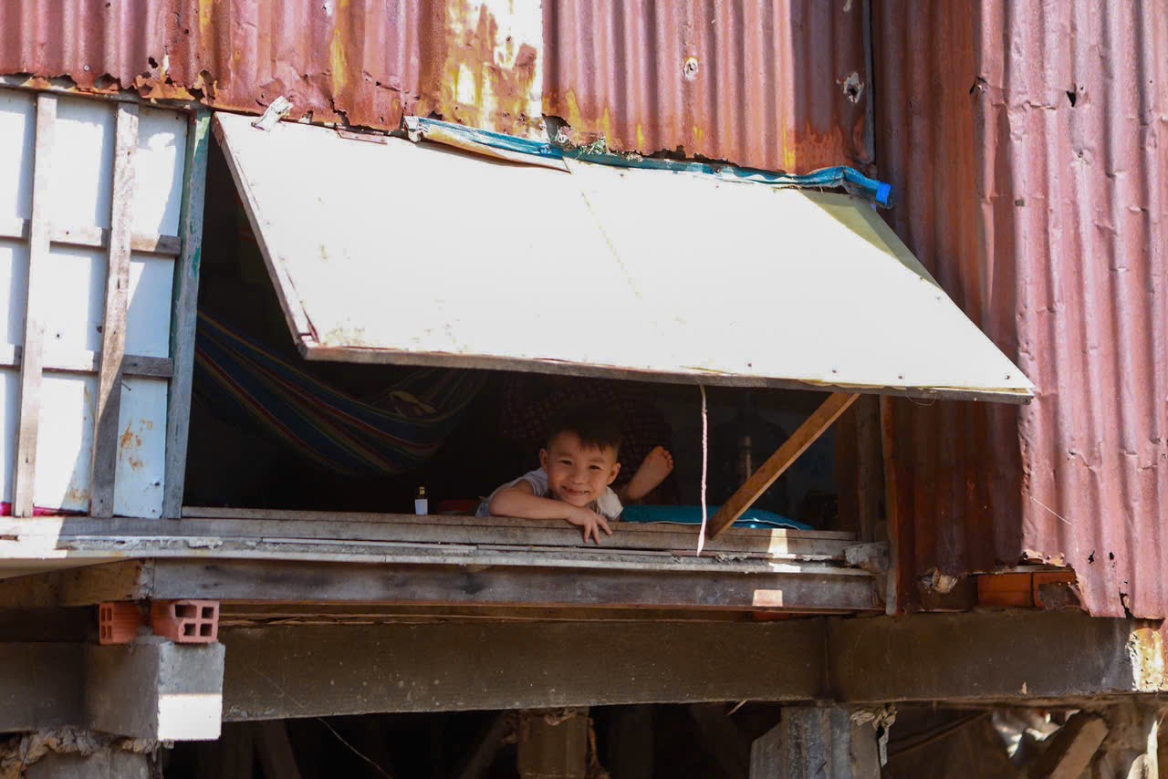 TP.HCM nhìn từ sông Sài Gòn: Những cuộc đời 'ký gửi' ven kênh- Ảnh 12.