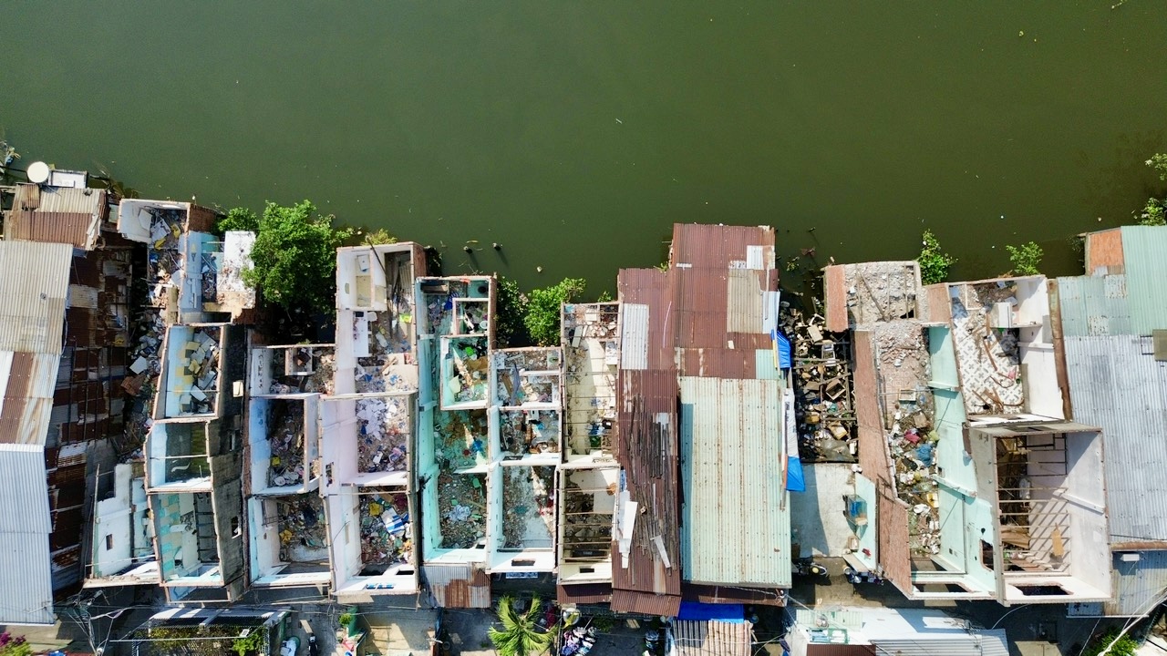 TP.HCM nhìn từ sông Sài Gòn: Những cuộc đời 'ký gửi' ven kênh- Ảnh 15.