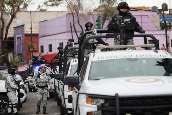 National Guards patrol the area outside of the General Prosecutors headquarters in Mexico City, Sunday, Feb. 22, 2026, after authorities reported that the Mexican Army killed Jalisco New Generation Cartel leader Nemesio Oseguera, known as El Mencho. (AP Photo/Ginette Riquelme)