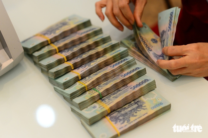 Tin tức sáng 28-2 - Ảnh 2. Tin tức sáng 28-2: Đề xuất nâng hạn mức bảo hiểm tiền gửi gần gấp 3; Biến động nhân sự ở Vinaconex - Ảnh 2.