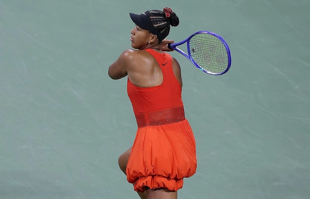 Naomi Osaka rực rỡ trong bộ trang phục toàn cam. Ảnh: RG vô địch Mỹ mở rộng Osaka