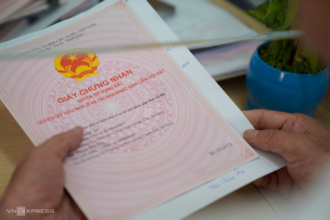 Giao dịch trong mua bán bất động sản thường dễ phát sinh vi phạm về trốn thuế. Ảnh: Nguyễn Đông