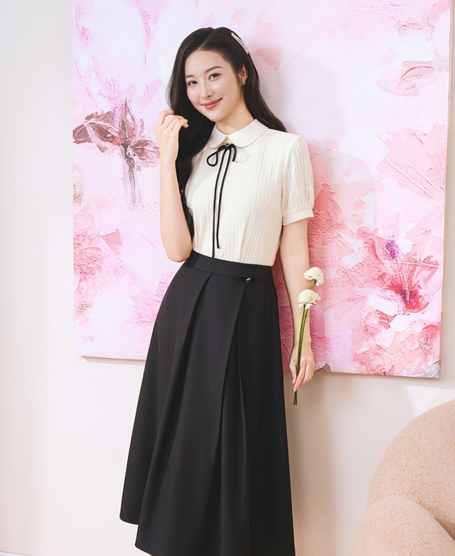 Váy xếp ly, điểm nhấn cho phong cách công sở hiện đại- Ảnh 3.