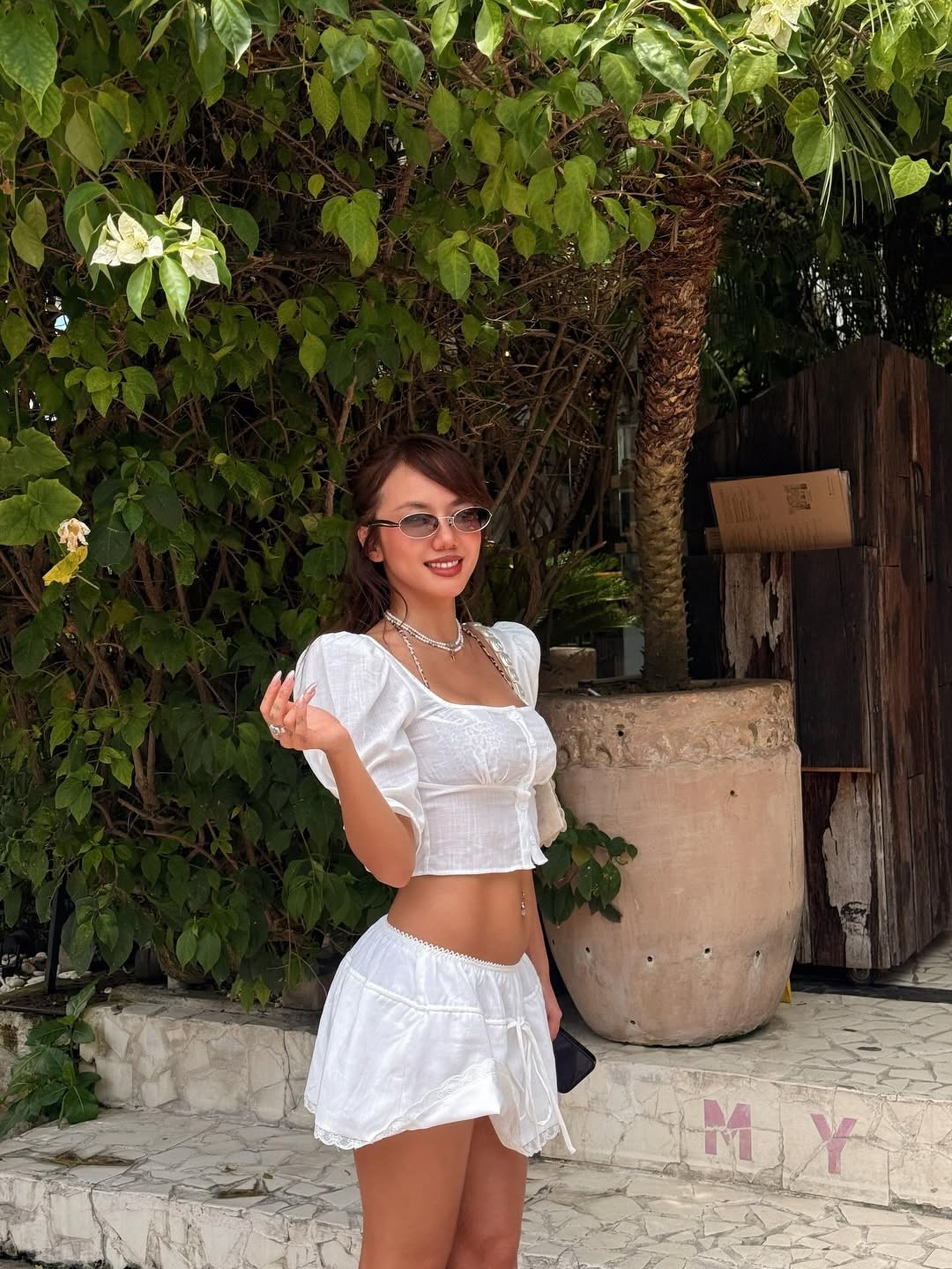 Phương Ly sau khi nhuộm da: Gu thời trang táo bạo, diện bikini gây sốt - 10