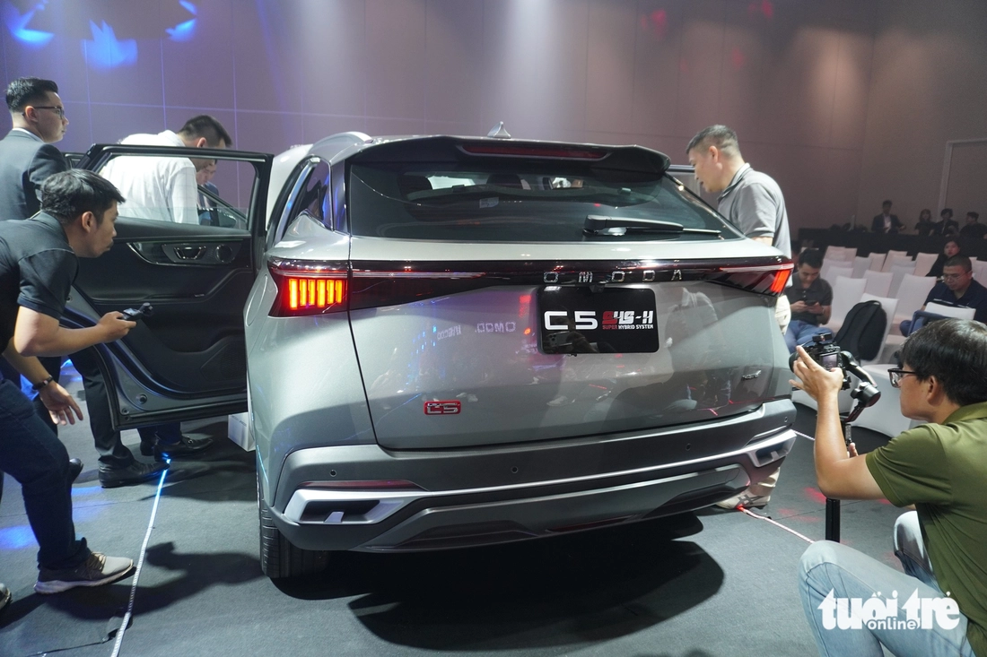 Omoda C5 SHS ra mắt Việt Nam: Máy hybrid đấu Toyota Corolla Cross, giá từ 599 triệu có điều kiện - Ảnh 15.