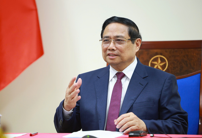 Thủ tướng Phạm Minh Chính điện đàm với Thủ tướng Algeria Sifi Ghrieb tối 18/3. Ảnh: VGP