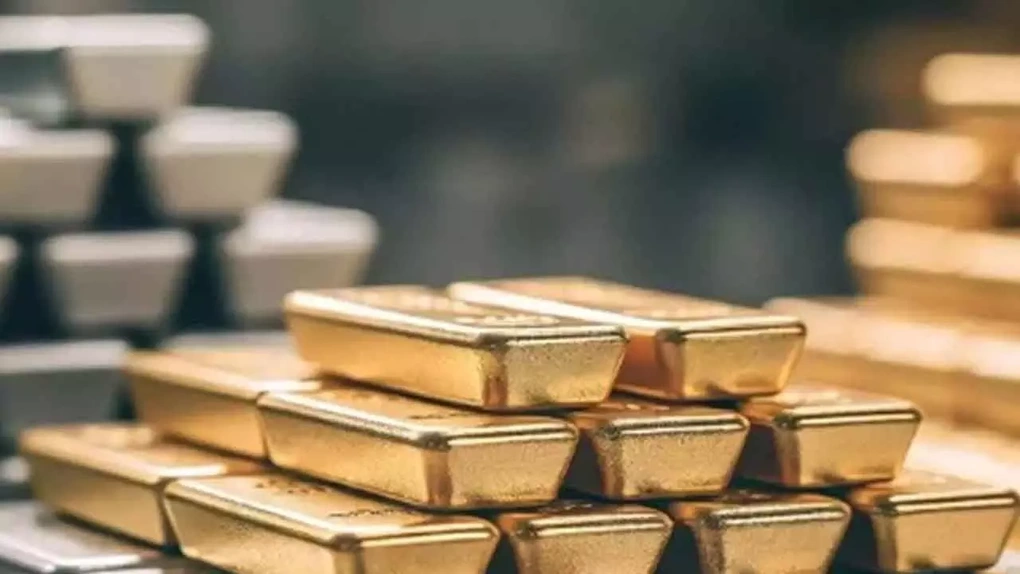 Vàng rơi sát mốc 5.000 USD/ounce, bạc lao dốc mạnh nhất nhiều tuần - 1