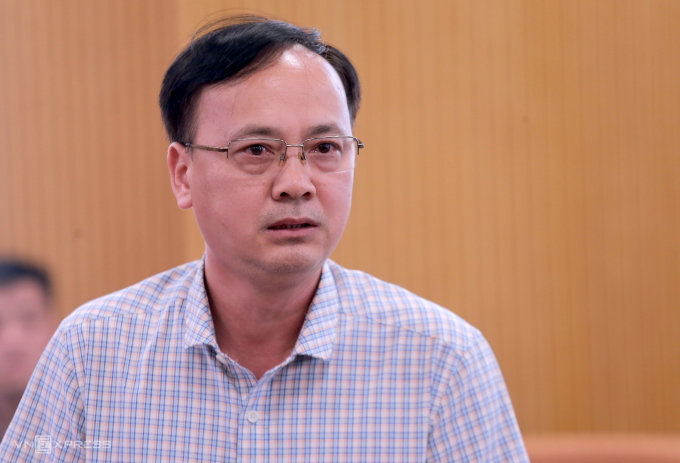 Ông Phan Quang Minh trả lời tại họp báo sáng 1/4. Ảnh: Gia Chính