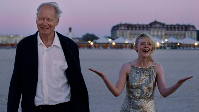 Stellan Skarsgård (trái) và Elle Fanning trong Sentimental Value. Ảnh: Mubi