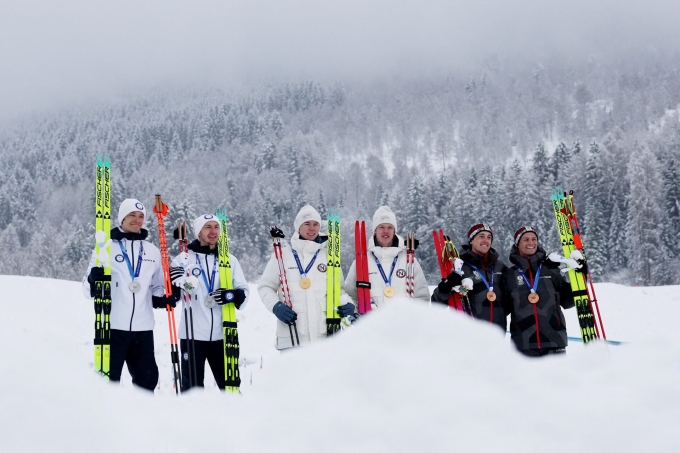 [Caption][1/2]Milano Cortina 2026 Olympics - Nordic Combined - Team Sprint, Victory Ceremony - Tesero Cross-Country Skiing Stadium, Lago, Italy - February 19, 2026. Gold medallists Andreas Skoglund of Norway and Jens Luraas Oftebro of Norway celebrate after winning the Team Sprint, with silver medallists Ilkka Herola of Finland and Eero Hirvonen of Finland and bronze medallists Stefan Rettenegger of...Purchase LicensingRights