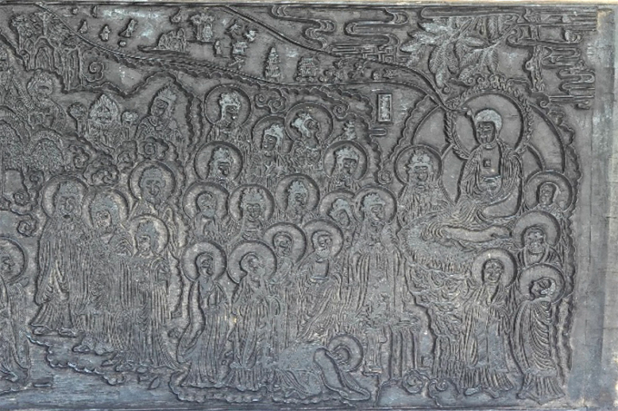 Mộc bản đồ họa gồm bảy mặt ván khắc đóng vai trò phi họa (tranh mở đầu) cho 7 quyển của Diệu pháp liên hoa kinh hiện lưu giữ tại tổ đình Thập Tháp. Ảnh: Nguyễn Đình Hưng